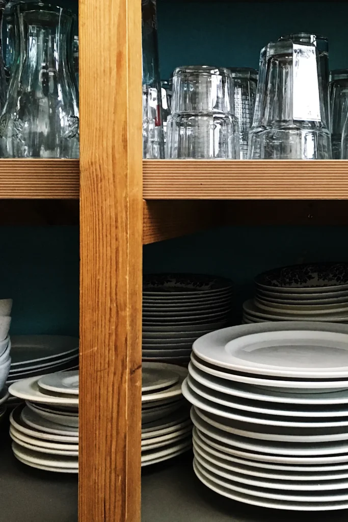 Crockery on shelves at Lazy Crofter Bunkhouse